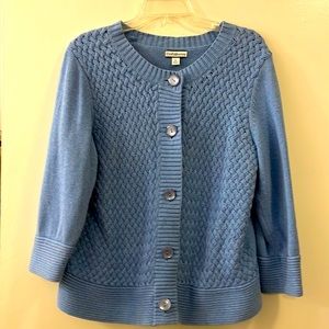 Basket weave, waist length cardigan sweater.